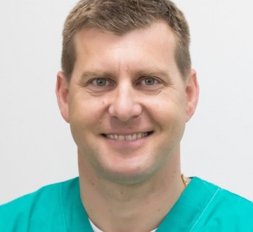 Olaf John, dr.med. dent., spec. oralni kirurg